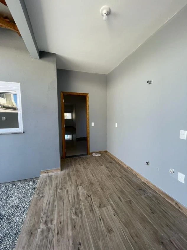Casa Geminada com 1 suíte + 2 dormitórios á 700 metros do mar – Itacolomi – Balneário Piçarras – SC